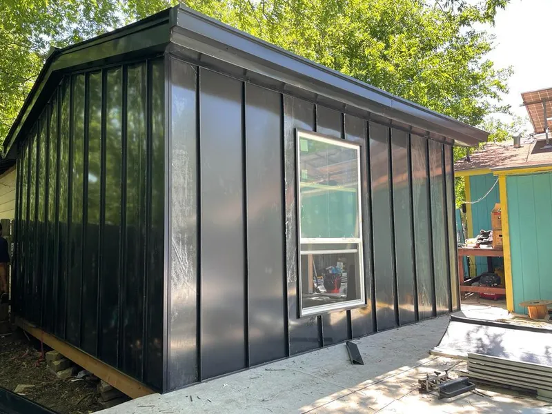 Black standing seam metal wall panels for Roof Inspection in Beaumont