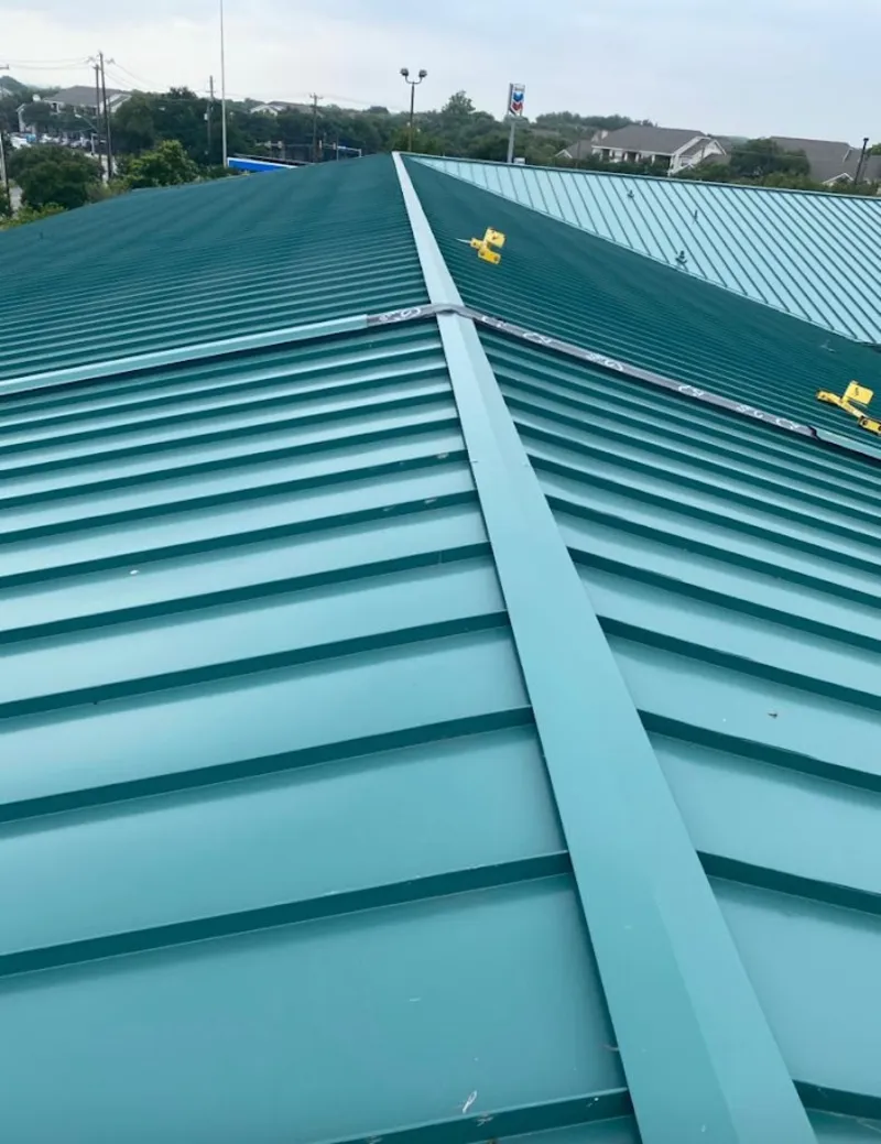 Green commercial metal roof ridge and valley for Metal Roof Repair in Beaumont