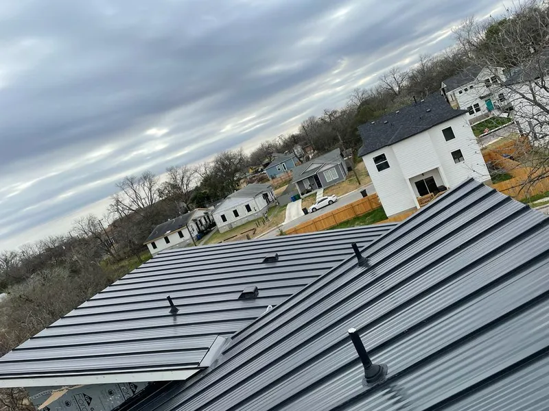 Standing seam metal roof panels with vents for Skylight Repair in Beaumont
